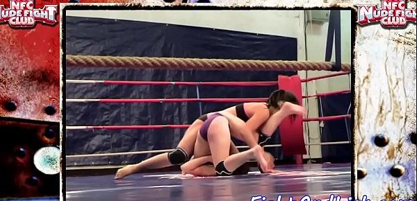  Wrestling lesbian dominates over babe